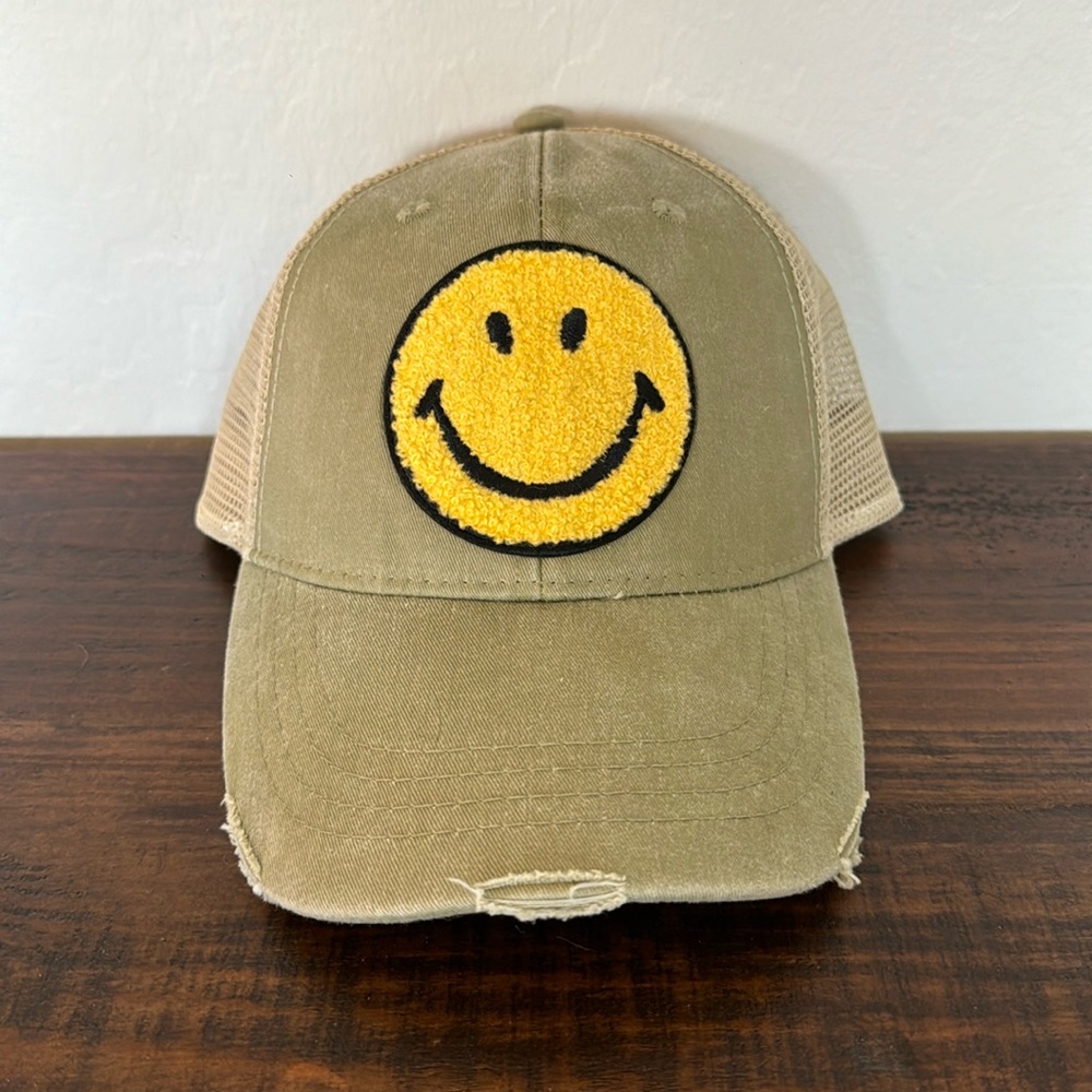 Smiley face distressed trucker hat